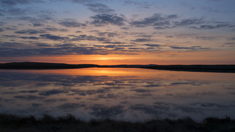 Pre-dawn sky over West Baugh Fell Tarn Pre-dawn sky over West Baugh Fell Tarn