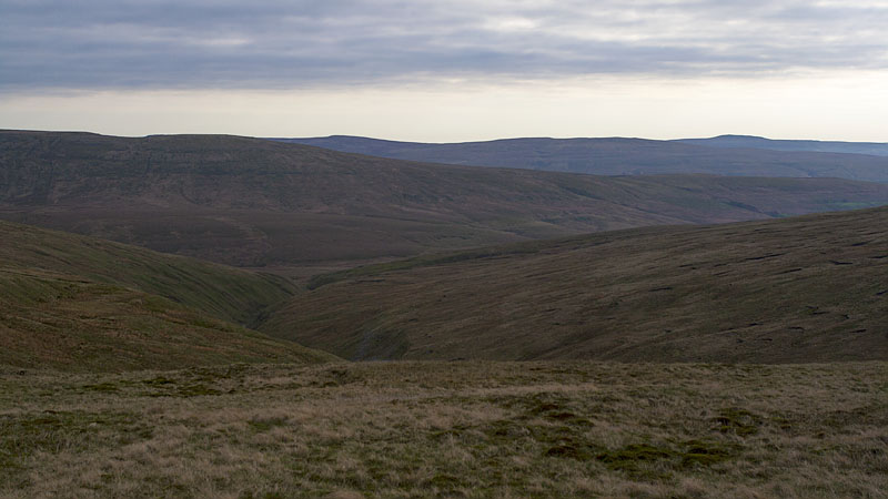 Muted view over East Baugh Fell towards the High Seat ridge Muted view over East Baugh Fell towards the High Seat ridge