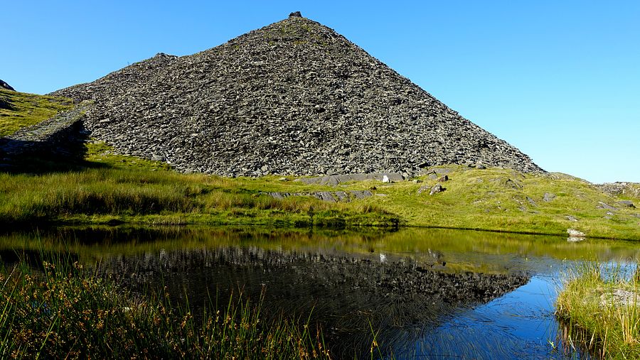 Quarry spoil heap and pool on the ascent from Rhosydd